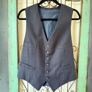 Men's vintage vest size Med. Purchased from a wardrobe set.